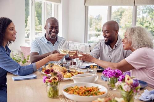 Family celebrating their parents reverse mortgage closing